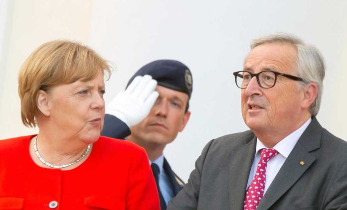 Merkel-Junker-prosfygiko-lysh-eyrwph-faz